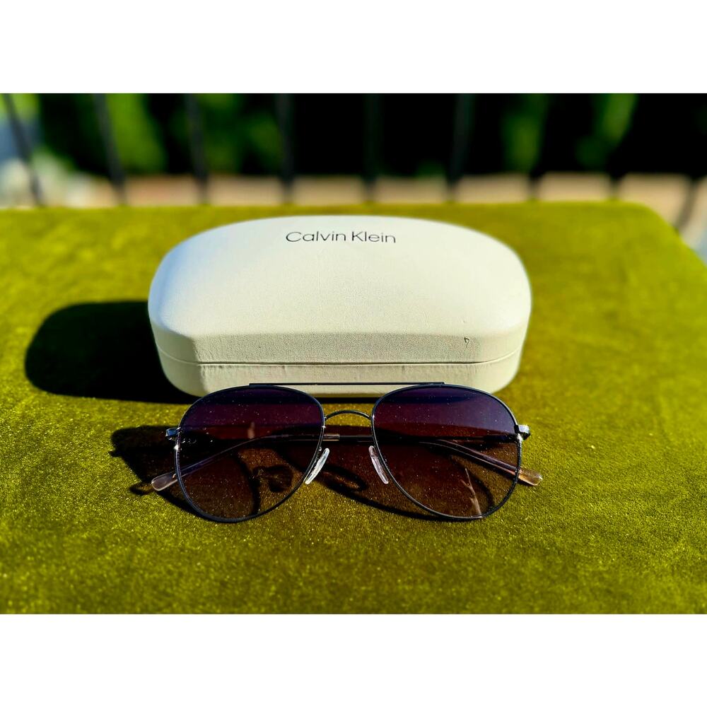 Calvin Klein Black Frame Sunglasses with Dark Gradient Lenses